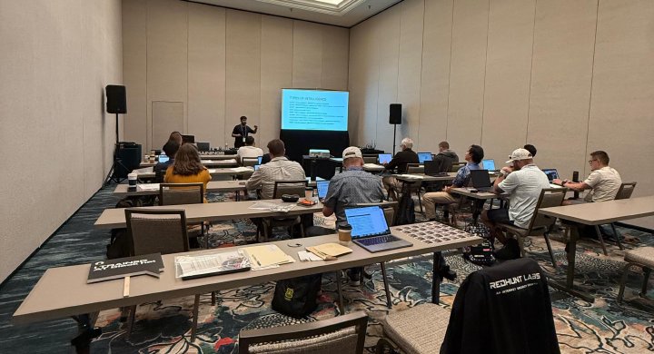 Black Hat training classroom with attendees working through offensive reconnaissance labs